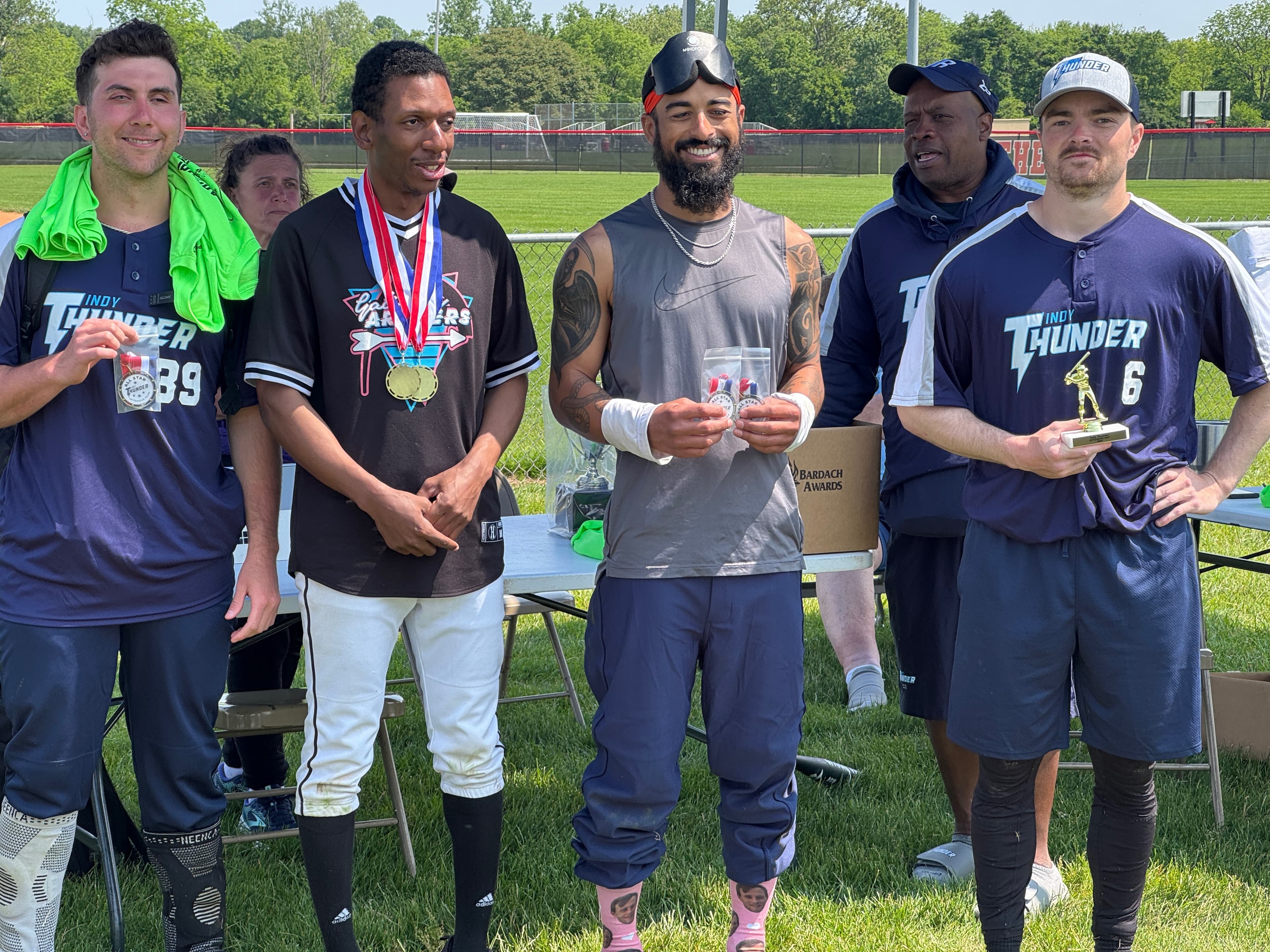 Justin Holland receiving Offense MVP award at the Thunder 2025 Tournament